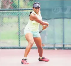  ?? — Photos by Chai Chang Yu ?? India’s Shivani Amineni hits a return during her match against China’s Zhao Xichen in the girls singles third round yesterday. Shivani won 6-2, 7-6 (5).