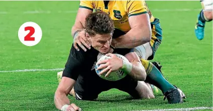  ?? PHOTOSPORT/ GETTY IMAGES ?? 2 4 Beauden Barrett worked around the clock for his four tries – the most by an All Black in a test against Australia.