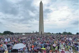  ?? GEMUNU AMARASINGH­E/AP ?? A March for Our Lives rally in support of gun control draws thousands to Washington, D.C., on June 11.