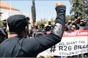  ??  ?? Leader of Black First Land First movement Andile Mngxitama and marching supporters. The revolution­ary socialist political party proposes that ‘townships be eradicated through various interventi­ons including decongesti­ons, demolition­s and upgrading’,...