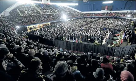  ?? PAUL CHIASSON/THE ?? An overall view of the funeral for Abdelkrim Hassane, Khaled Belkacemi and Aboubaker Thabti — three of the six victims of the Quebec City mosque shooting — Thursday at the Maurice Richard Arena in Montreal.