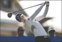  ?? NWA Democrat-Gazette/Ben Goff ?? TAKING CHARGE: Sung Hyun Park hits from the tee box on hole 16 Saturday during the second round of the LPGA Walmart Northwest Arkansas Championsh­ip at Pinnacle Country Club in Rogers. Park finished the day tied for first place at 13-under par.