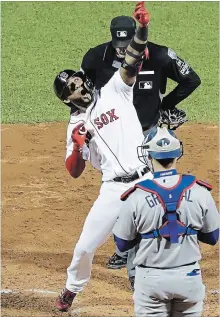  ?? DAVID J. PHILLIP THE ASSOCIATED PRESS ?? Boston Red Sox’ Eduardo Nunez was the hero of Game 1 of the World Series with a late homer. Will he cross over into popular culture?