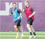 ?? AFP ?? Belgium’s Eden Hazard, left, and Kevin De Bruyne during a training session.