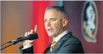  ?? MATT BAKER/TNS ?? New Florida State coach Mike Norvell has been forced to answer questions about the Seminoles’ COVID-19 testing procedures.