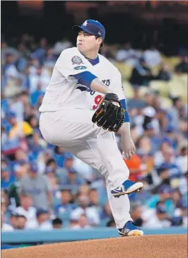  ?? Wally Skalij Los Angeles Times ?? HYUN-JIN RYU, a controvers­ial choice to start Game 1, made it look like a brilliant decision by striking out eight and giving up four hits in seven innings.