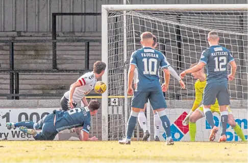  ??  ?? CAPTAIN’S ROLE: Kyle Benedictus heads Raith into the lead at Somerset Park before Ayr hit back to earn a point.