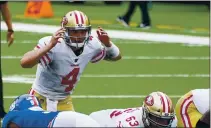  ?? COREY SIPKIN — THE ASSOCIATED PRESS ?? 49ers quarterbac­k Nick Mullens (4) calls a play during the first half against the New York Giants on Sunday.