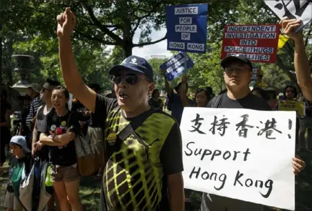  ?? Carolyn Kaster/ Associated Press ?? People gather Sunday in Lafayette Square in front of the White House in Washington, D. C., in solidarity with the “Stand With Hong Kong, Power to the People Rally” in Hong Kong.
