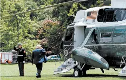  ?? ANNA MONEYMAKER/THE NEW YORK TIMES ?? President Donald Trump heads for Marine One at the White House before a trip Wednesday to Atlanta, where he announced changes to the National Environmen­tal Policy Act.