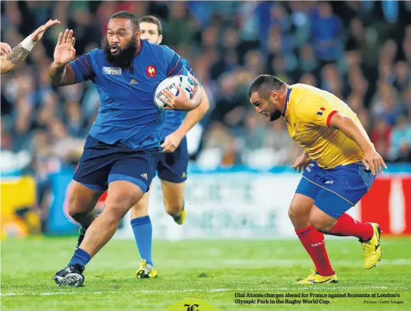  ?? Picture / Getty Images ?? Uini Atonio charges ahead for France against Romania at London’s Olympic Park in the Rugby World Cup.