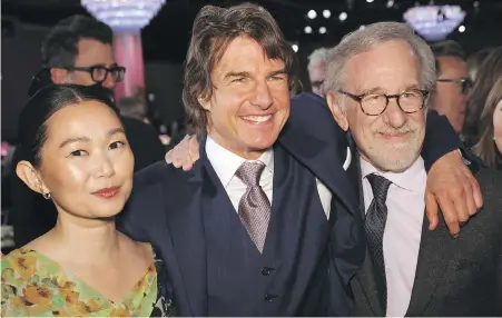  ?? WILLY SANJUAN, INVISION, AP ?? From left, Hong Chau, Tom Cruise and Steven Spielberg attend the 95th Academy Awards Nominees Luncheon on Feb. 13 at the Beverly Hilton Hotel in Beverly Hills, California.