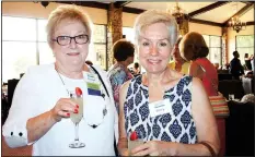  ?? NWA Democrat-Gazette/CARIN SCHOPPMEYE­R ?? Kitty Swank and Jane Vaughn visit at the ladies auxiliary luncheon.