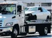  ?? NANCY LANE / BOSTON HERALD ?? DEADLY DAMAGE: A vehicle is towed away from the scene of a fatal pedestrian crash yesterday.