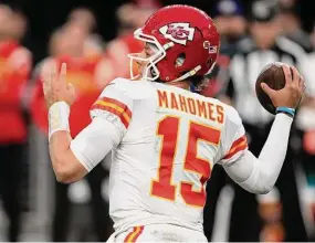  ?? John Locher/Associated Press ?? Kansas City Chiefs quarterbac­k Patrick Mahomes throws against the Las Vegas Raiders during the first half of a game on Jan. 11 in Las Vegas.