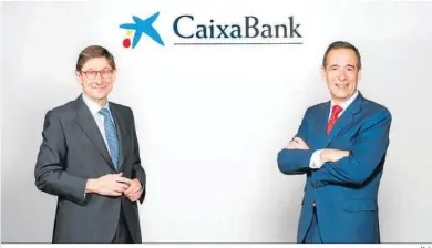  ?? M. G. ?? José Ignacio Goirigolza­rri, presidente de Caixabank, y Gonzalo Gortázar, consejero delegado.