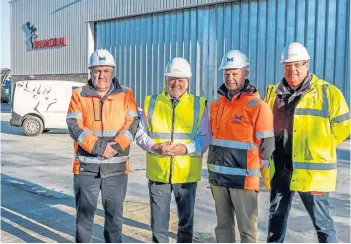  ?? ?? COMPLETE: CEO of Montrose Port Authority Tom Hutchison, chairman and managing director of Balmoral Group Sir Jim Milne, chairman of Montrose Port Authority board Peter Stuart and Subsea Test general manager at Balmoral Comtec Derek Weir.