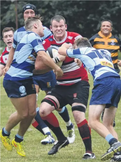  ?? Pictures: Chris Davey FM4498424 above, FM4498439 left Buy these pictures from kentonline.co.uk ?? Maidstone battle to retain possession against Dover, above, and, left, during their eight-try win on Saturday at The Mote