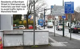  ?? ?? Residents of Burnham Street in Sherwood say motorists use their road to avoid traffic lights in Mansfield Road
