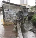  ?? —PHOTO COURTESY OF CEBU CITY INFORMATIO­N OFFICE ?? WATERWAY CLEARING Structures that encroach on the Lahug-Kamputhaw-Tejero waterway in Cebu City have been ordered demolished by the local government, including this concrete shed in this photo taken on Nov. 25, in a bid to address the city’s flood problem.