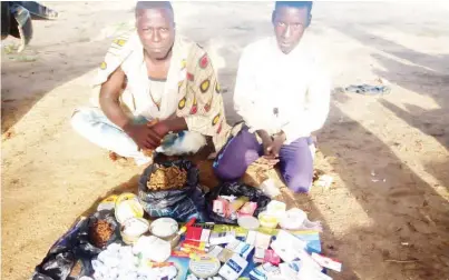  ?? PHOTO: Army Headquarte­rs ?? Two suspected Illicit drug peddlers after their arrests at a suspected hideout in Filin Kokuwa area by troops of 33 Brigade in Toro LGA of Bauchi State yesterday.