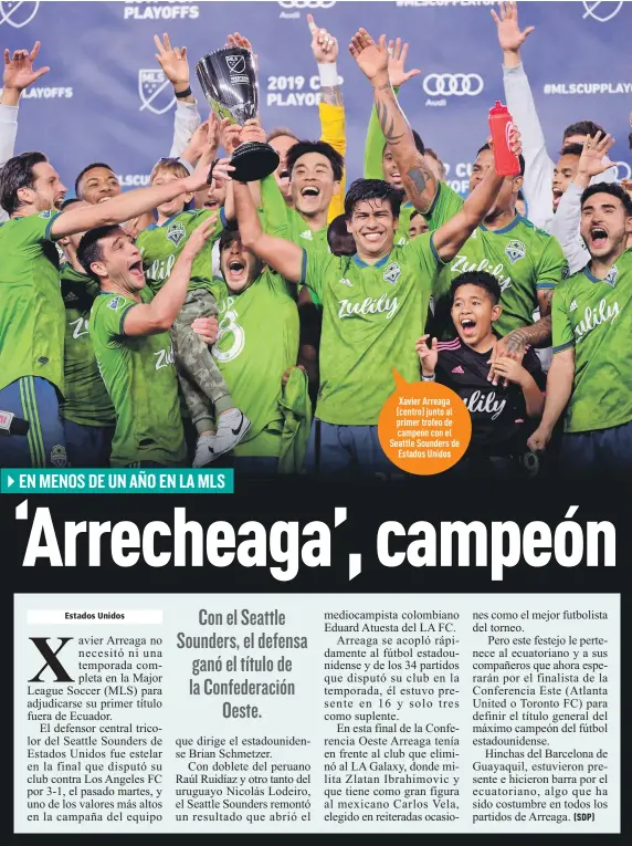  ?? Foto: AFP ?? Xavier Arreaga (centro) junto al primer trofeo de campeón con el Seattle Sounders de
Estados Unidos