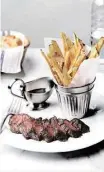  ?? Aria Resort & Casino ?? Michael Mina’s new Bardot Brasserie at Aria serves steak frites and other French fare.