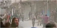  ?? - Social Media Website via Reuters TV ?? PROTEST: A still image taken from a video uploaded by the Ghouta Media Centre on Sunday, purportedl­y shows gunmen as residents protest against fighting between rebel factions, in an area said to be in Eastern Ghouta, Syria.