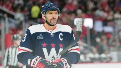  ?? JESS RAPFOGEL/AP ?? Capitals coach Peter Laviolette said he doesn’t envision Alex Ovechkin, above, will be back “in the foreseeabl­e future” as he attends to a family matter and the health of a loved one.