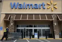  ?? ASSOCIATED PRESS FILE PHOTO ?? Wal-Mart Inc. stopped accepting Visa in Thunder Bay stores on Monday.