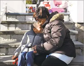 ?? Tyler Sizemore / Hearst Connecticu­t Media ?? Tonya Gonsalves embraces her adopted child SeanMichae­l, 5, at their home in Westport on Monday. Gonsalves is SeanMichae­l’s great aunt and adopted him in October 2015 after SeanMichae­l’s mother experience­d drug problems.