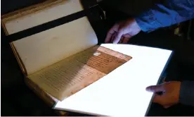  ?? Photograph: British Library ?? Seeing hidden text in pages from William Camden's Annals was ‘incredible’, said an expert.