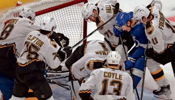  ?? JIM DAVIS/GLOBE STAFF ?? All six Bruins on the ice were there to prevent the Lightning’s Vladislav Namestniko­v from scoring in the first period at TD Garden.