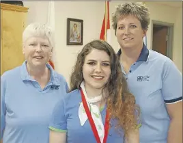  ?? LYNN CURWIN/TRURO DAILY NEWS ?? Girl Guide leaders Debbie Mellish, left, and Lorena Fortune, right, are seen with Olivia Hingley, a Pathfinder who earned her Canada Cord this year.