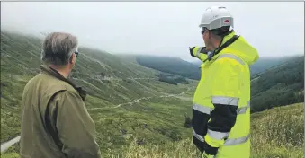  ??  ?? Brendan O’Hara MP with Kevin Campbell of BEAR Scotland at the Rest and be Thankful last week.