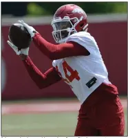  ?? (NWA Democrat-Gazette/Andy Shupe) ?? Arkansas freshman wide receiver Bryce Stephens catches a pass during practice Saturday in Fayettevil­le. Stephens caught nine touchdown passes last season as a senior at Oklahoma City John Marshall.