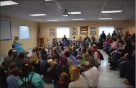  ?? MARIAN DENNIS — MEDIANEWS GROUP ?? Drag Queen Story Hour packed an activity room at the Exeter Community Library Saturday. While the room was filled with attendees, outside the library was also crowded with protesters and counter protesters.