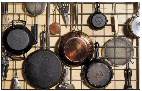  ??  ?? In small kitchens, a pot rack can free up space in cabinets. For The Washington Post/STACY ZARIN GOLDBERG