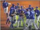  ?? MORRY GASH - THE ASSOCIATED
PRESS ?? Chicago Cubs starting pitcher Alec Mills is swarmed by teammates after throwing a no hitter at a baseball game against the Milwaukee Brewers Sunday, Sept. 13, 2020, in Milwaukee. The Cubs won 12-0.