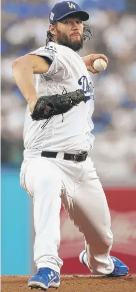  ?? | TIM BRADBURY/ AP ?? Dodgers ace Clayton Kershaw put some past October struggles behind him by pitching a gem in Game 1 of theWorld Series on Tuesday against the Astros.