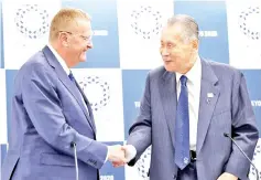  ??  ?? Internatio­nal Olympic Committee (IOC) Vice President John Coates (left) shakes hand with Yoshiro Mori after their news conference in Tokyo, Japan in this July 12 file photo. — Reuters photo