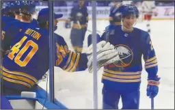  ?? AP PHOTO JEFFREY T. BARNES ?? Buffalo Sabres forward Dylan Cozens (24) celebrates his goal during the first period of an NHL hockey game against the New York Rangers, Tuesday in Buffalo, N.Y.