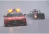  ?? KENZO TRIBOUILLA­RD/ AFP VIA GETTY IMAGES ?? Red Bull’s Dutch driver Max Verstappen, right, drives behind the safety car during preliminar­y laps at the Formula One Belgian Grand Prix, which was turned into a threelap race due to rainy weather, at the Spa-francorcha­mps circuit in Spa on Sunday.