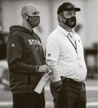  ?? Brett Coomer / Staff photograph­er ?? Jack Easterby, left, the Texans’ executive vice president of football operations, would like to have CEO Cal McNair’s ear when it comes to naming a new general manager.