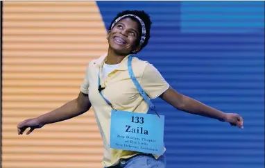  ?? AP PHOTO BY JOHN RAOUX ?? Zaila Avant-garde, 14, from Harvey, Louisiana celebrates after winning the finals of the 2021 Scripps National Spelling Bee at Disney World Thursday, July 8, in Lake Buena Vista, Fla.