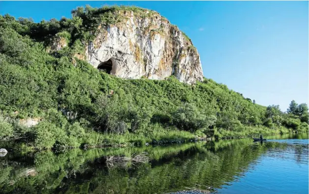  ?? Picture: BENCE VIOLA ?? ANCIENT SHELTER: Chagyrskay­a cave, in the Altai Mountains of southern Siberia in Russia. Scientists have sequenced the genomes of 11 Neandertha­l individual­s based on remains found in the cave.