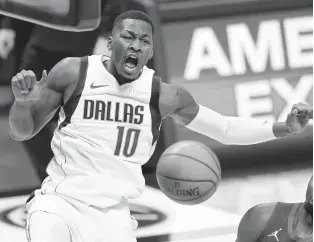  ?? JACK DEMPSEY/ASSOCIATED PRESS ?? Former Norcom High, Virginia Tech and Florida Gators standout Dorian Finney-Smith, shown Thursday, is one of several Mavericks who missed a game Saturday because of contact tracing. Monday’s Dallas game was called off.