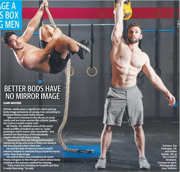  ??  ?? Trainers Toa Faataape, 23, and Asher Steele, 30, at the CrossFit Brisbane, Coorparoo gym. Photograph­er: Liam Kidston