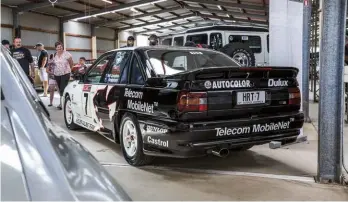  ??  ?? The Holden Racing Team’s 1991 promo car is alive and well in Alice Springs, having been rescued and restored by owner Mark Coulton. Starting life as a fivespeed Commodore SS, it was lifted from the line and fitted with a Calais interior and VN Group A bodykit. Genuine VN Group As stopped at build number 302, so the Group A build number 304 on the dash is a bit of a surprise
