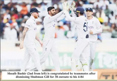  ?? ?? Shoaib Bashir (2nd from left) is congratula­ted by teammates after dismissing Shubman Gill for 38 enroute to his 4-84